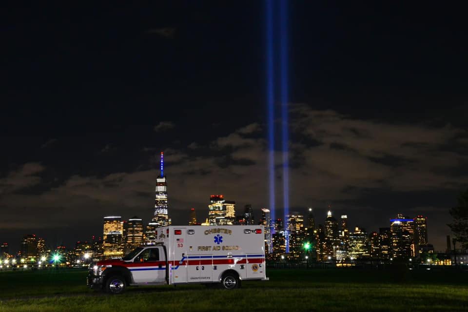 CFAS Ambulance with 911 Blue Lights Backdrop